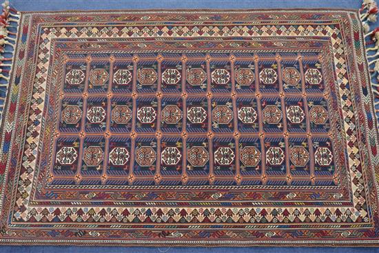 A Persian tasselled rug 147 by 102cm